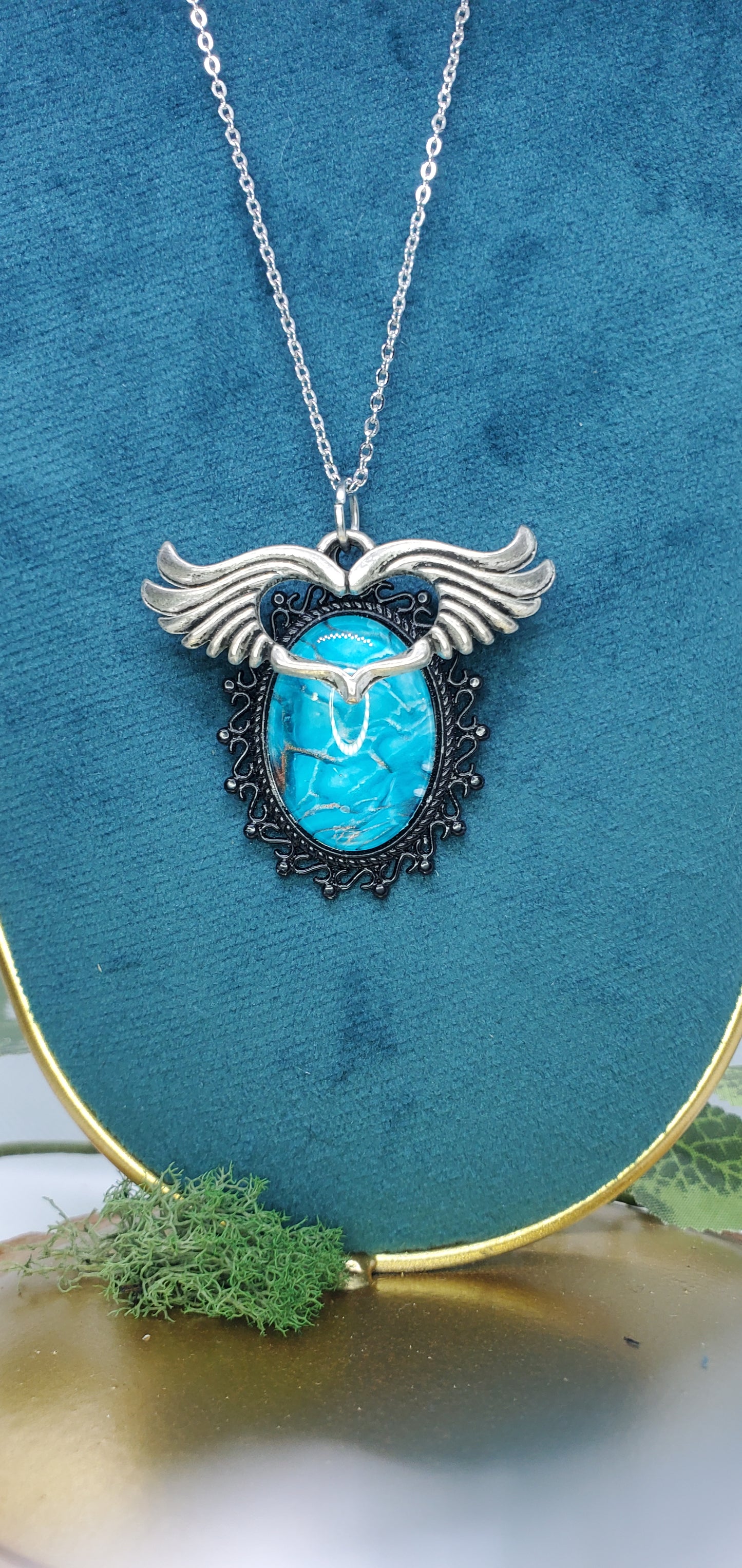 Brilliant Blue Fluid Art Necklace with Silver Wings