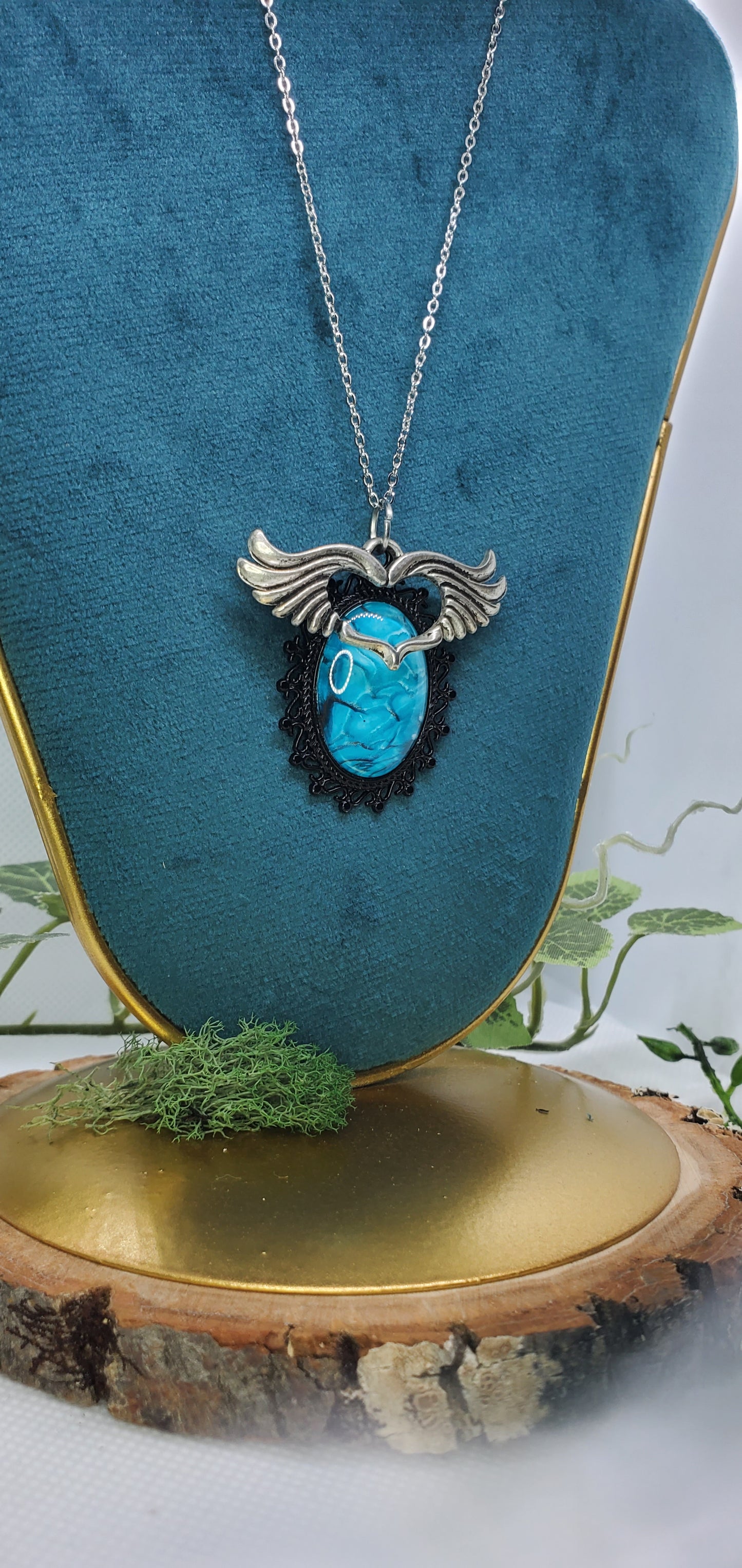 Brilliant Blue Fluid Art Necklace with Silver Wings