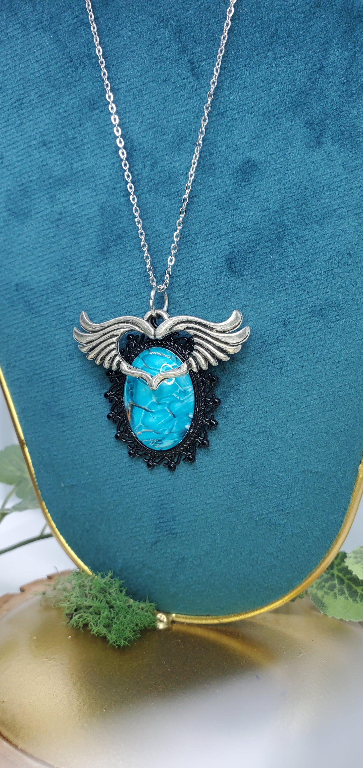 Brilliant Blue Fluid Art Necklace with Silver Wings