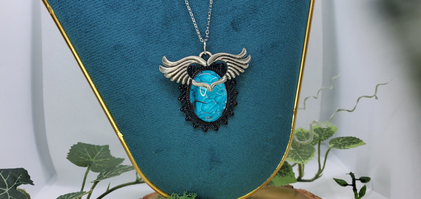 Brilliant Blue Fluid Art Necklace with Silver Wings