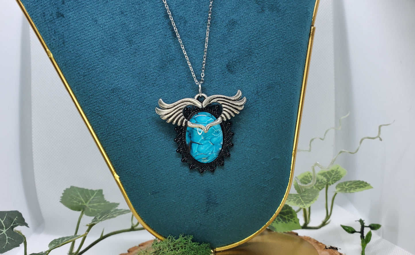 Brilliant Blue Fluid Art Necklace with Silver Wings