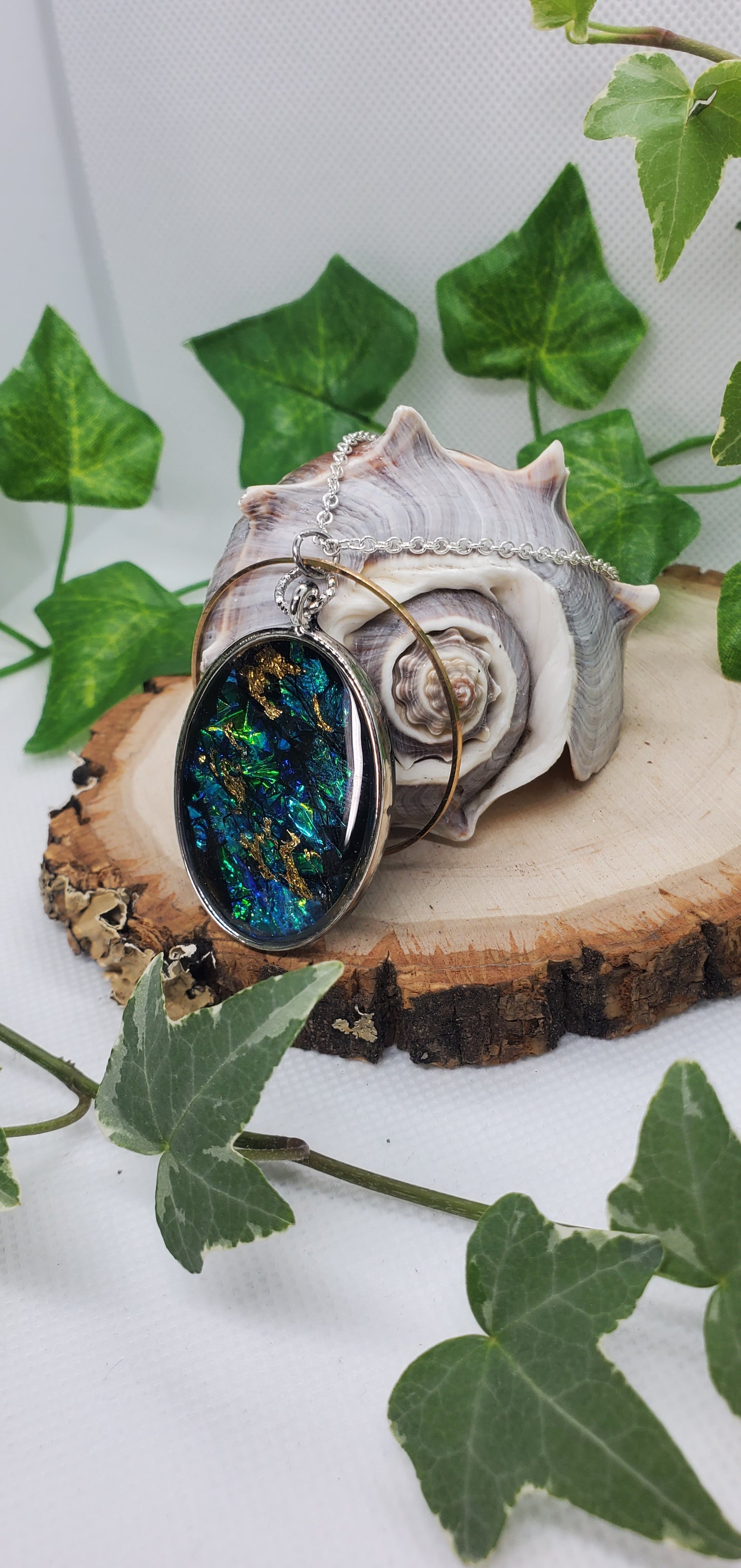 Resin Art Necklace with Blue, Silver, and Gold