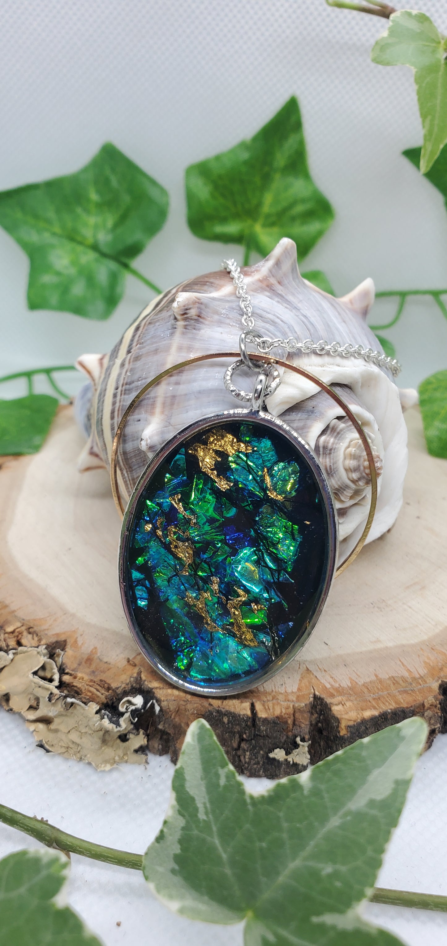 Resin Art Necklace with Blue, Silver, and Gold