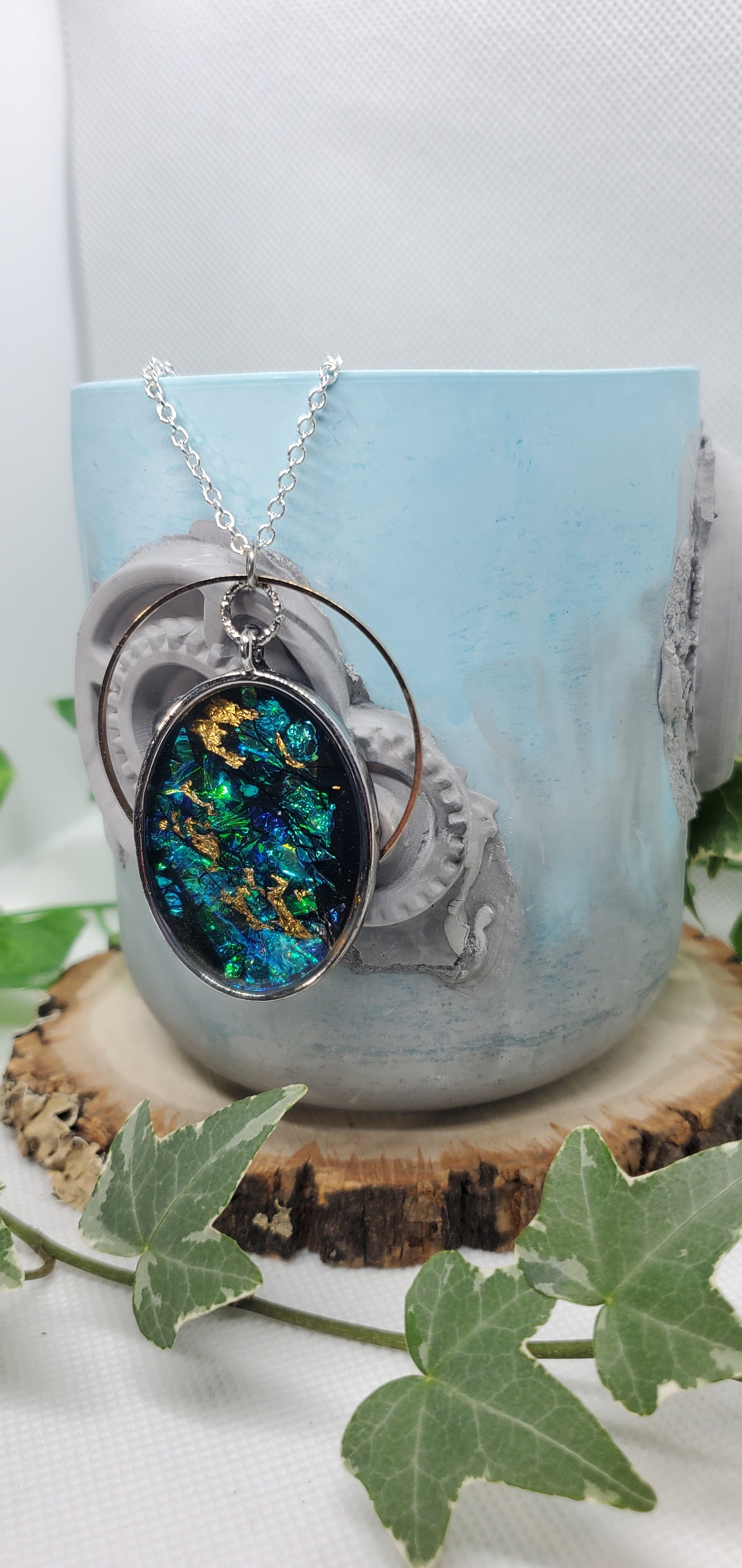 Resin Art Necklace with Blue, Silver, and Gold