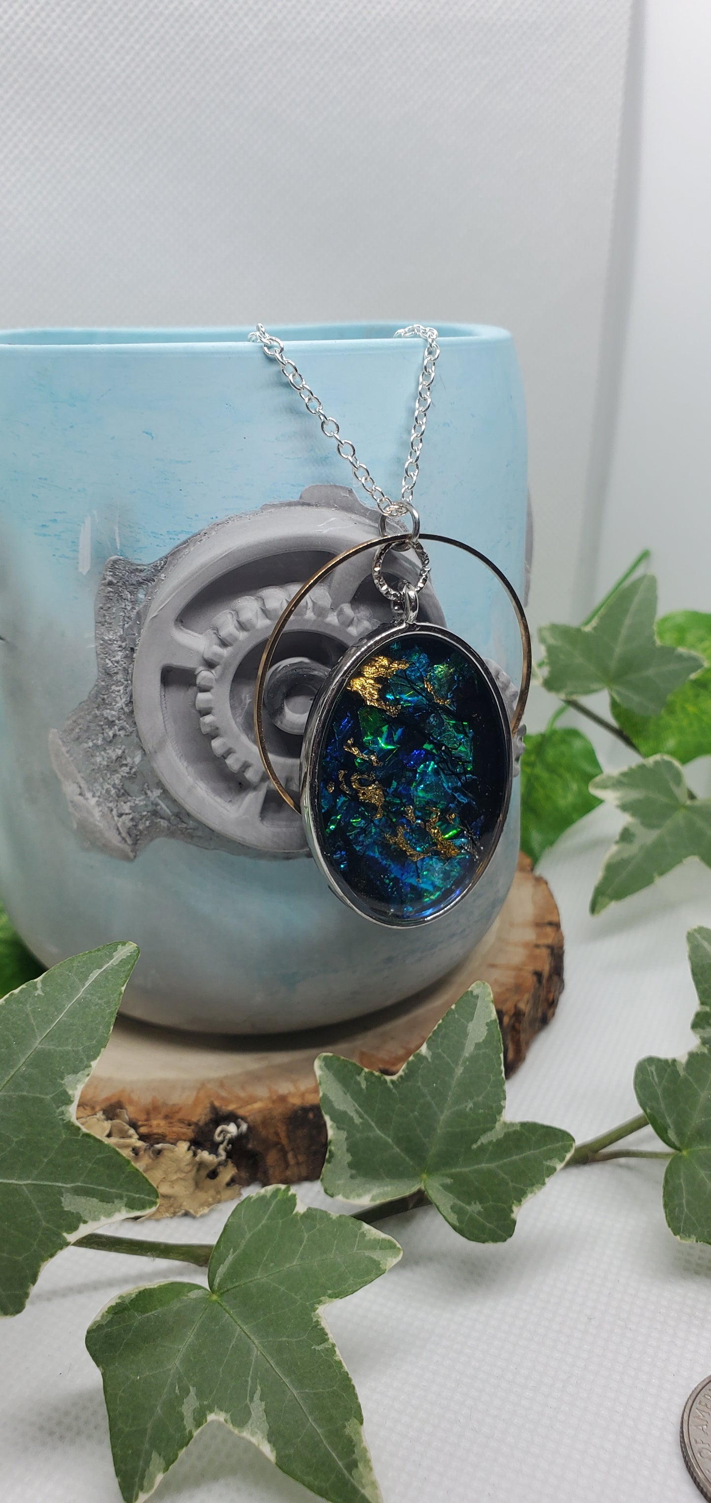 Resin Art Necklace with Blue, Silver, and Gold