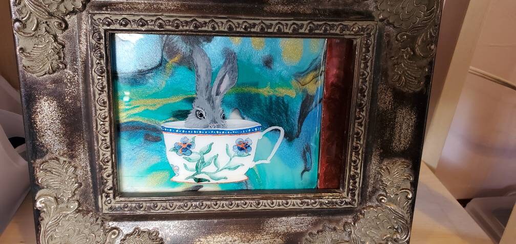 Rabbit in a Teacup framed resin pour and acrylic painting